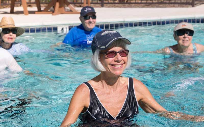 Casa de Las Campanas wellness program includes seniors doing water aerobics