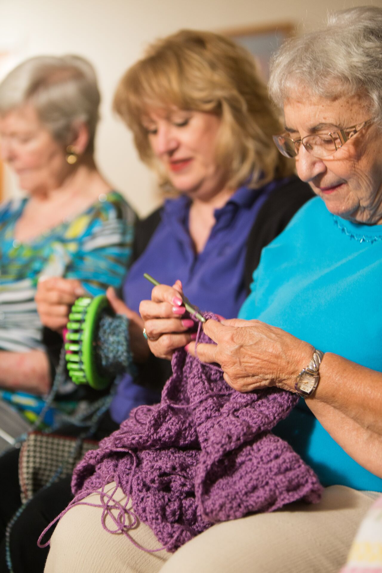 Casa residents crocheting